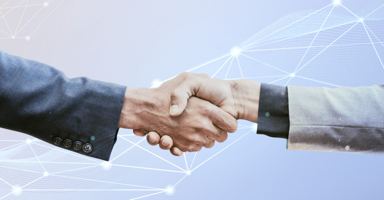 Partnership handshake innovation corporate business concept